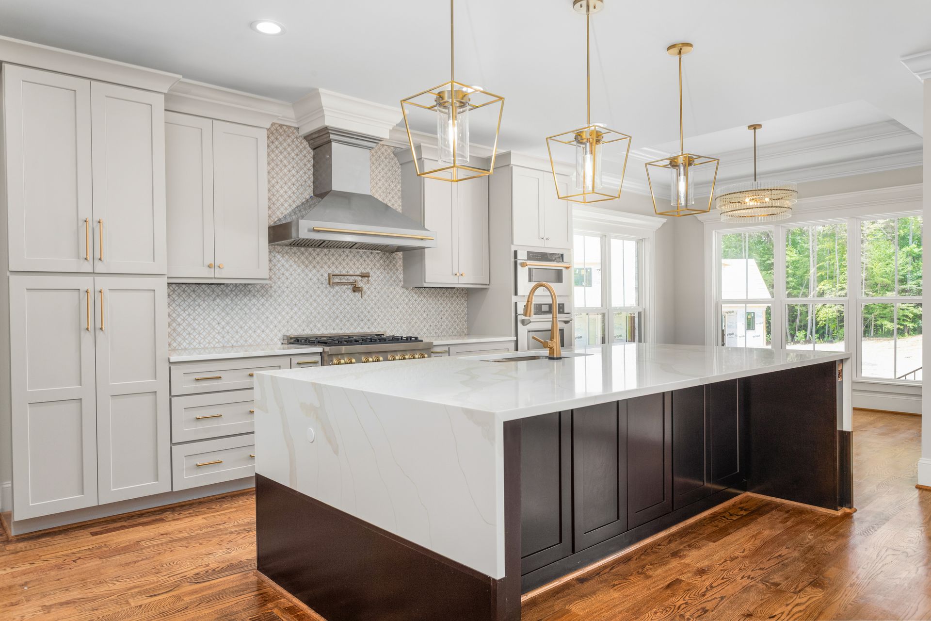 Kitchen with half waterfall island